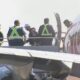 Lionel Messi disembarks a plane.