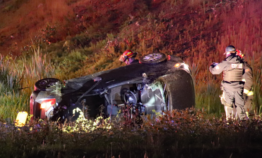 The driver has been arrested after a single-vehicle crash in Surrey early Sunday morning that sent four people to hospital.