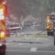 Authorities work the scene where a small plane crashed into a San Diego neighborhood, setting several homes on fire and forcing evacuations along several blocks early Thursday, May 22, 2025. (AP Photo/Gregory Bull)