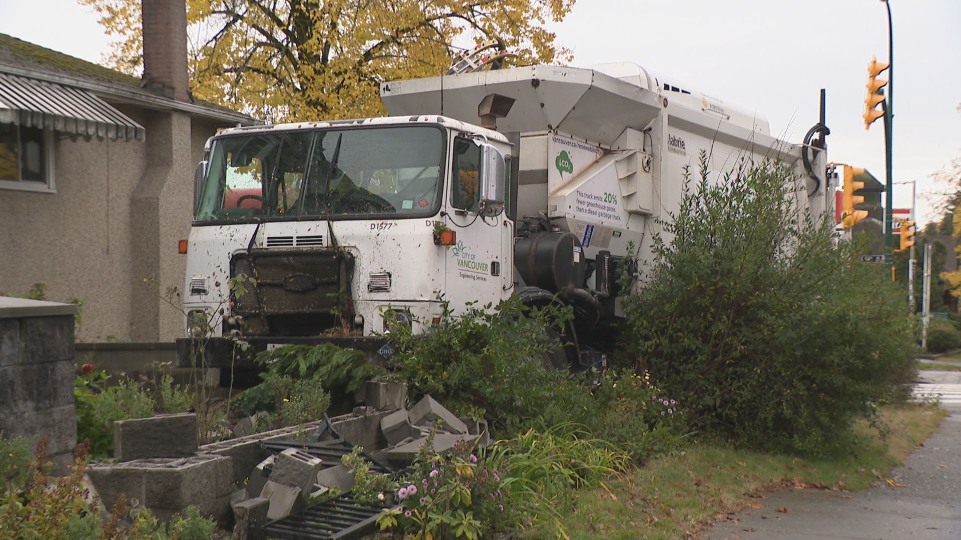 A City of Vancouver waste collection truck crashed into a front yard